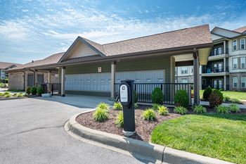 a house with a parking meter in front of it at Century Belmont Station, Louisville, Kentucky